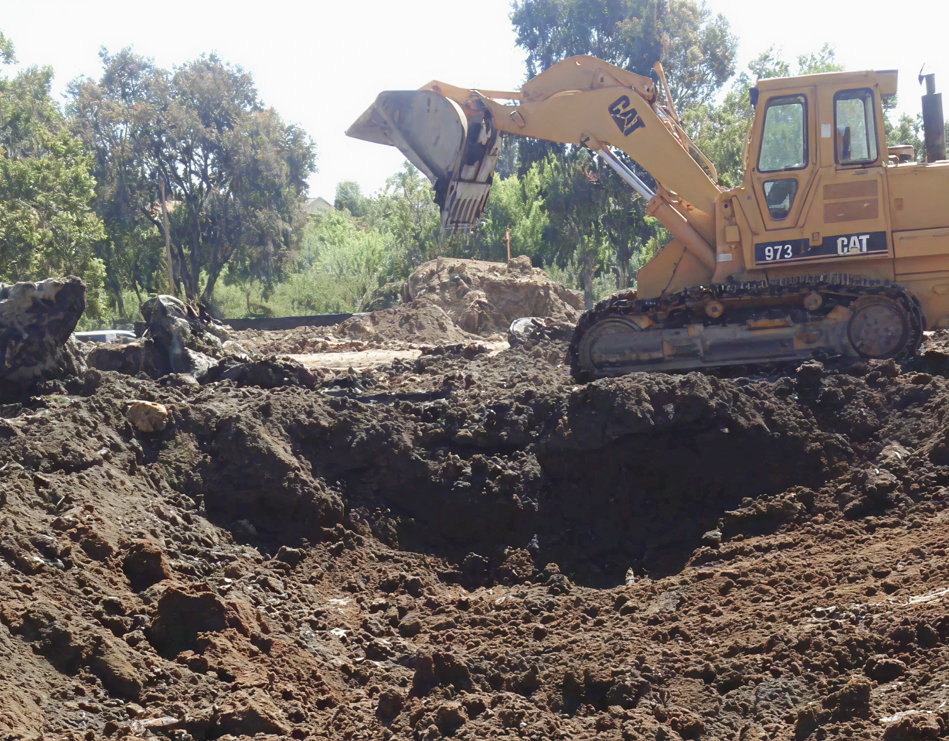 Heavy machinery excavating earth